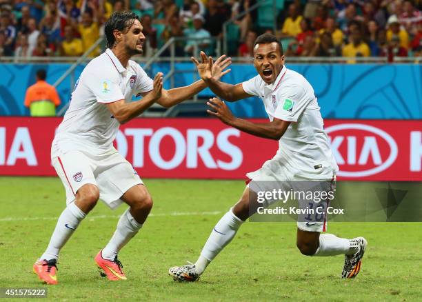 Julian Green of the United States celebrates scoring his team's first goal in extra time with Chris Wondolowski during the 2014 FIFA World Cup Brazil...