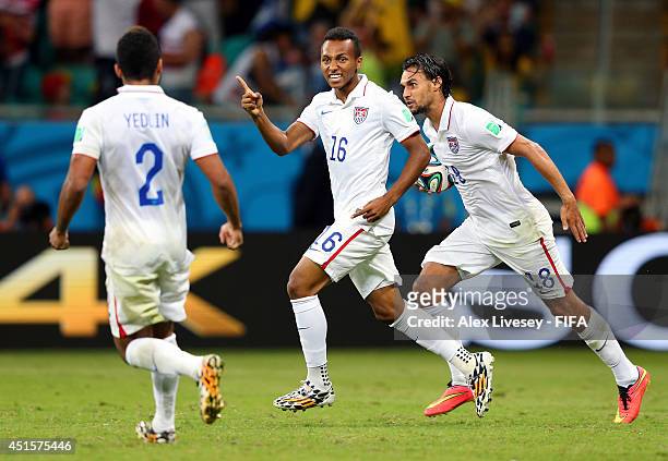 Julian Green of the United States celebrates scoring his team's first goal with his teammates DeAndre Yedlin and Chris Wondolowski during the 2014...