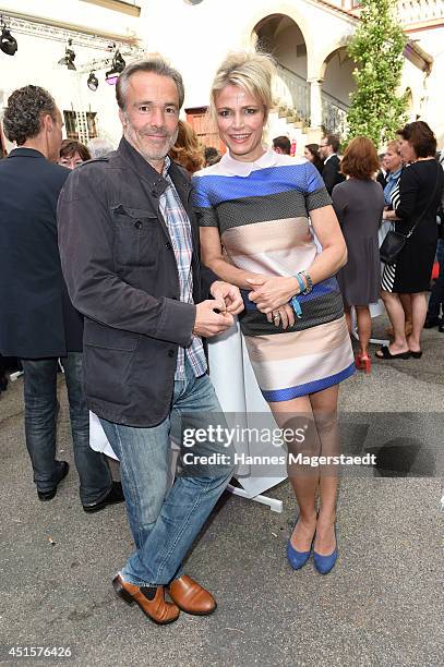 Actress Ursula Gottwald and Hannes Jaenicke attend the Bavaria Reception at the Kuenstlerhaus as part of the Munich Film Festival 2014 on July 1,...