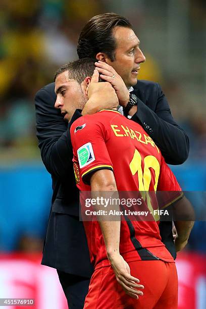 Eden Hazard of Belgium is hugged by head coach Marc Wilmots as he is replaced during the 2014 FIFA World Cup Brazil Round of 16 match between Belgium...