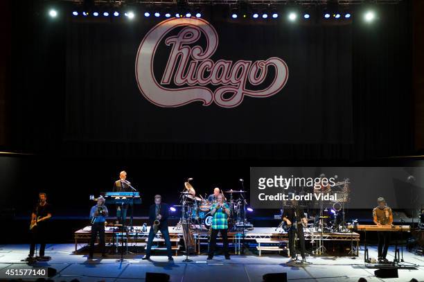 Keith Howland, James Pankow, Walter Parazalder, Tris Imboden, Lee Loughnane, Jason Scheff and Robert Lamm of Chicago perform on stage at L'Auditori...