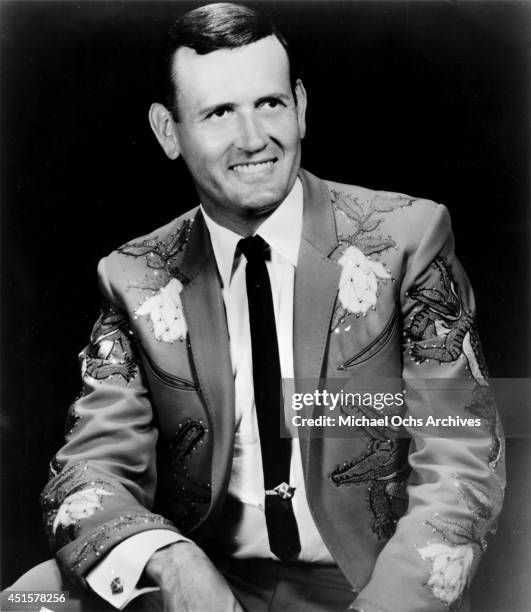 Country music and Grand Ole Opry star Jimmy C. Newman poses for a portrait wearing a Nudie Suit designed by Nudie Cohn with Alligators embroidered on...