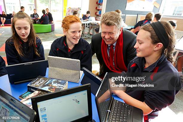 Labour leader David Cunliffe speaks to students, Grace Blyth and Brooke Chandler , while announcing a schools initiative at Fergusson Intermediate on...