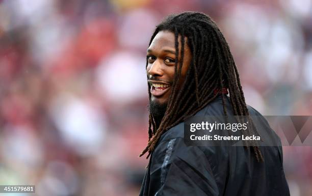 Jadeveon Clowney of the South Carolina Gamecocks watches on from the bench during their game against the Coastal Carolina Chanticleers at...