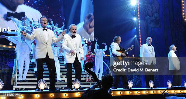 Michael Palin, Terry Gilliam and Eric Idle at the opening night of "Monty Python Live " at The O2 Arena on July 1, 2014 in London, England.