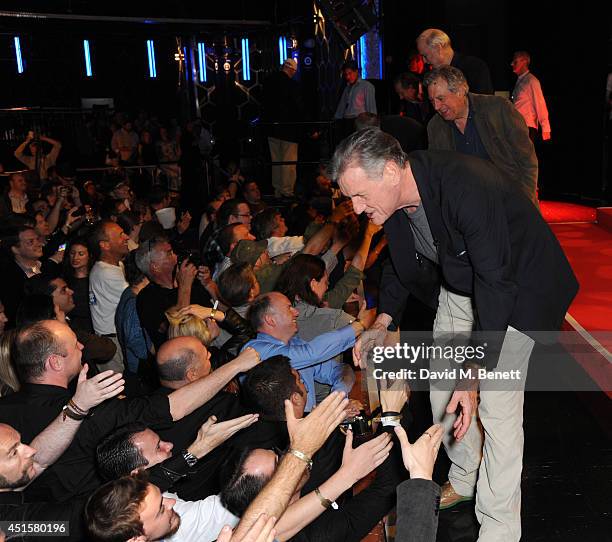 Michael Palin and fans at the opening night of "Monty Python Live " at The O2 Arena on July 1, 2014 in London, England.