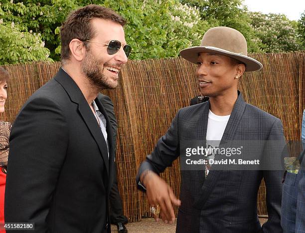 Bradley Cooper and Pharrell Williams attend The Serpentine Gallery Summer Party co-hosted by Brioni at The Serpentine Gallery on July 1, 2014 in...