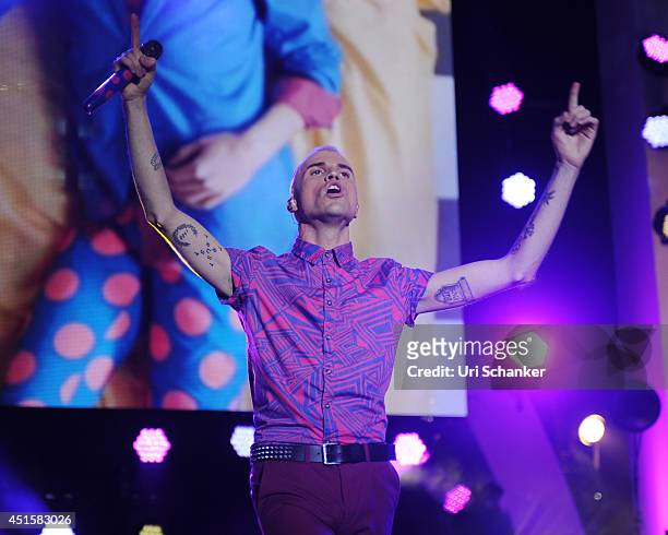 Tyler Glenn of Neon Trees performs during the iHeartRadio Ultimate Pool Party Presented By VISIT FLORIDA At Fontainebleau's BleauLive at...