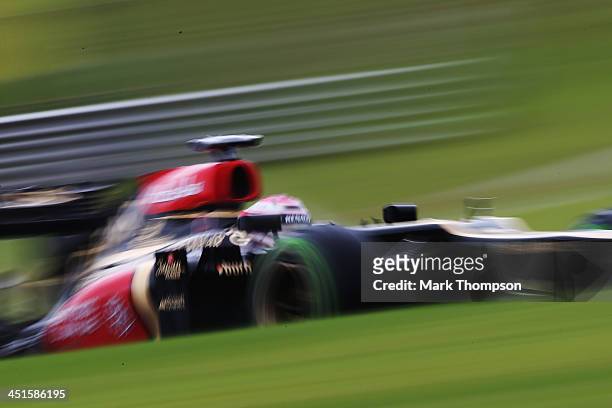 Heikki Kovalainen of Finland and Lotus drives during qualifying for the Brazilian Formula One Grand Prix at Autodromo Jose Carlos Pace on November...