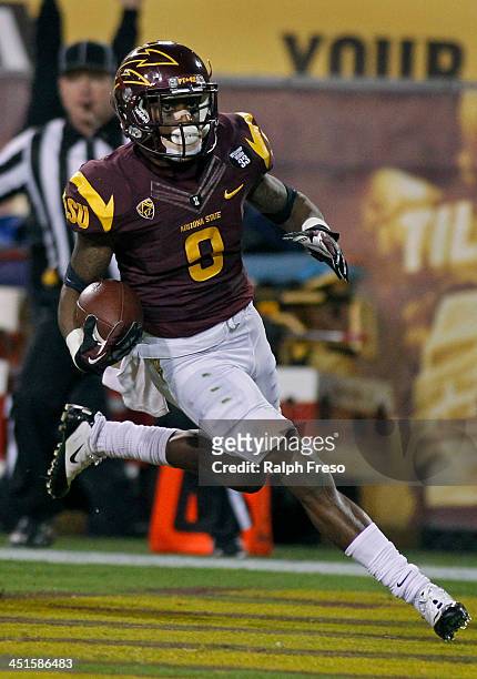 Defensive back Robert Nelson of the Arizona State Sun Devils returns an interception for a touchdown against the Oregon State Beavers during the...