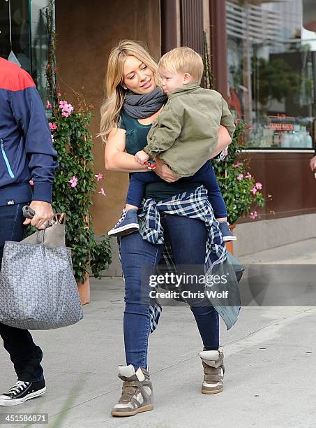 Hilary Duff is seen with son Luca Cruz Comrie on November 23, 2013 in Los Angeles, California.