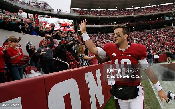 McCarron of the Alabama Crimson Tide celebrates their 49-0 win over the Chattanooga Mocs at Bryant-Denny Stadium on November 23, 2013 in Tuscaloosa,...