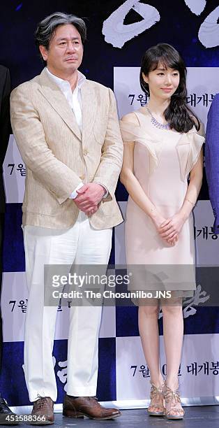 Choi Min-Sik and Lee Jung-Hyun attend the movie 'Roaring Currents' press conference at Apgujeong CGV on June 26, 2014 in Seoul, South Korea.