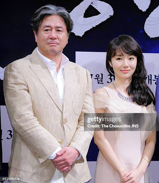 Choi Min-Sik and Lee Jung-Hyun attend the movie 'Roaring Currents' press conference at Apgujeong CGV on June 26, 2014 in Seoul, South Korea.