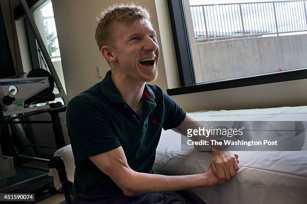Double arm transplant recipient, former U.S. Army Sgt. Brendan Marrocco poses for a portrait during occupational therapy at the Amputee Service...