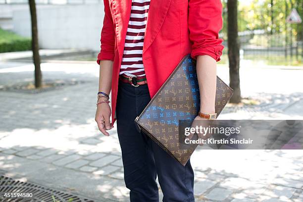 Editorial Director Wei Koh wearing a Rubinacci blazer, Acne trousers,  News Photo - Getty Images