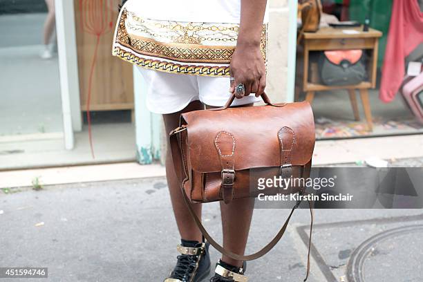 Flavio Semido Gabral wearing a Black Caviar top, Giuseppe Zanotti shoes and a vintage bag on day 2 of Paris Collections: Men on June 26, 2014 in...