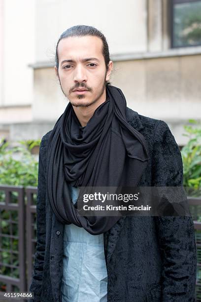 Fashion buyer Bilal Aliouat wearing a vintage coat and shirt, Yohji Yamamoto scarf on day 2 of Paris Collections: Men on June 26, 2014 in Paris,...