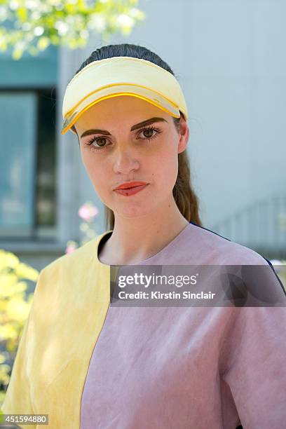 Stylist and Fashion writer Michelle Verpuggi wearing a Photoshop dress and visor on day 2 of Paris Collections: Men on June 26, 2014 in Paris, France.