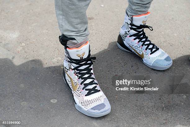 Model Kir They William wearing Kobe Bryant trainers, LMDR pants on day 2 of Paris Collections: Men on June 26, 2014 in Paris, France.