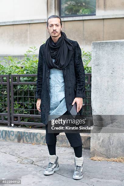 Fashion buyer Bilal Aliouat wearing a vintage coat and shirt, Yohji Yamamoto scarf, Alexander McQueen trainers and Rick Owens pants on day 2 of Paris...