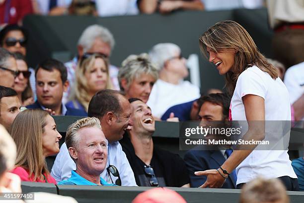 Andy Murray of Great Britain's girlfriend Kim Sears shakes a joke with his coach Amelie Mauresmo during his Gentlemen's Singles quarter-final match...