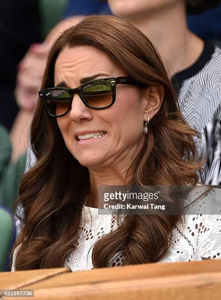 Catherine, Duchess of Cambridge attends the Simone Halep v Sabine Lisicki match on centre court during day nine of the Wimbledon Championships at...