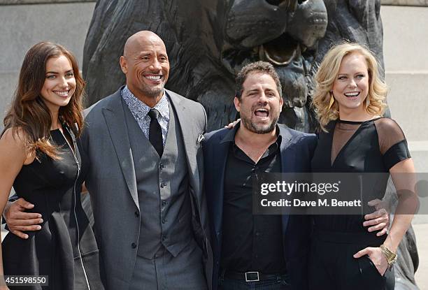 Irina Shayk, Dwayne "The Rock" Johnson, Brett Ratner and Ingrid Bolso Berdal attend a photocall for "Hercules" at Nelson's Column in Trafalgar Square...