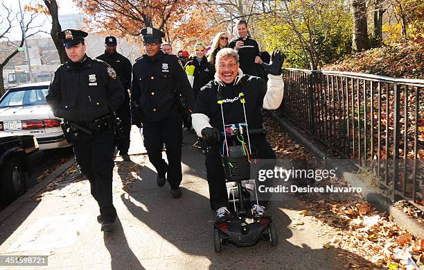 Elvis Duran and Z100's Uncle Johnny takes part in the 'Elvis Trumps Cancer Walk' for St. Jude Hospital at Camden Plaza Park on November 23, 2013 in...