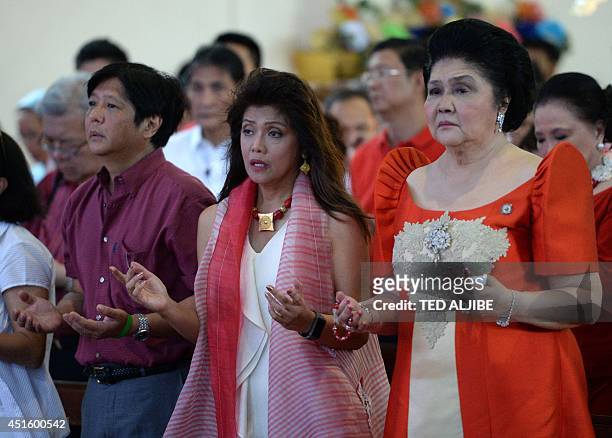 Philippine former first lady and now congresswoman, Imelda Marcos , her daughter governor Imee Marcos and her son, senator Ferdinand Marcos Jr.,...