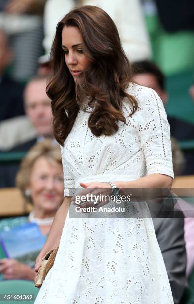 Catherine, Duchess of Cambridge and Prince William Duke of Cambridge watch the Gentlemen's Singles quarter-final match between Andy Murray of Great...