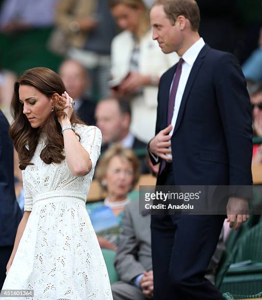 Catherine, Duchess of Cambridge and Prince William Duke of Cambridge watch the Gentlemen's Singles quarter-final match between Andy Murray of Great...