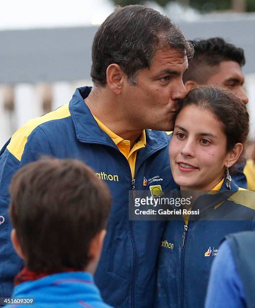 Rafael Correa, president of Ecuador kisses his daughter Sofia Correa after she won the bronze medal in the opening day of Sport Climbing as part of...