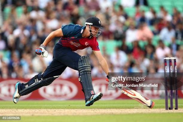 Fabian Cowdrey of Kent dives for the crease during the Natwest T20 Blast match between Surrey and Kent Spitfires at The Kia Oval on July 2, 2014 in...