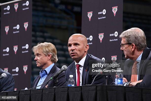 Co-owners Marc Lasry and Wesley Edens, and general manager John Hammond of the Milwaukee Bucks introduce Jason Kidd as the new head coach during a...