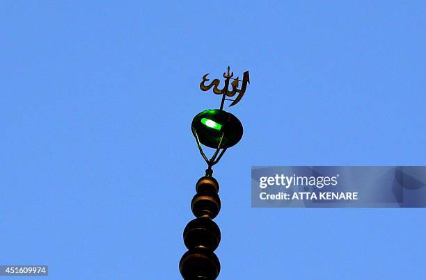 The Emamzadeh Saleh mosque minaret in Tajrish square in northern Tehran on July 2 is pictured during the holy month of Ramadan. Across the Muslim...