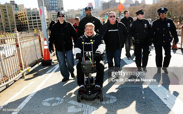 Elvis Duran and Z100's Uncle Johnny with Elvis Duran walk over the bridge during the 'Elvis Trumps Cancer Walk' for St. Jude Hospital at Camden Plaza...