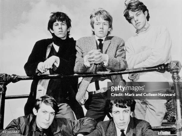 English rock and roll group The Rolling Stones posed by the river Thames in London in 1963. Clockwise from top left: Brian Jones , Keith Richards,...
