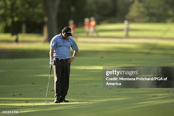 Phil Mickelson in the fairway on No. 18 during Round 1 of the 89th PGA Championship held at Southern Hills Country Club in Tulsa, Oklahoma. Thursday,...