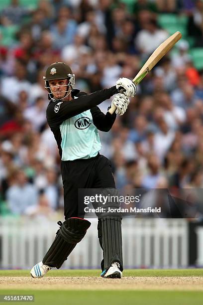 Jason Roy of Surrey hits out during the Natwest T20 Blast match between Surrey and Kent Spitfires at The Kia Oval on July 2, 2014 in London, England.