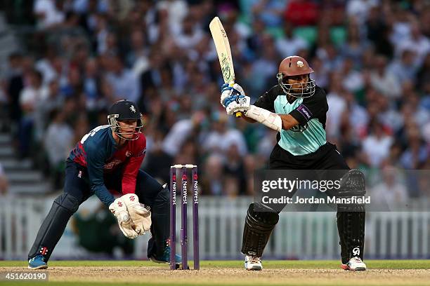 Tillakaratne Dilshan of Surrey hits out during the Natwest T20 Blast match between Surrey and Kent Spitfires at The Kia Oval on July 2, 2014 in...