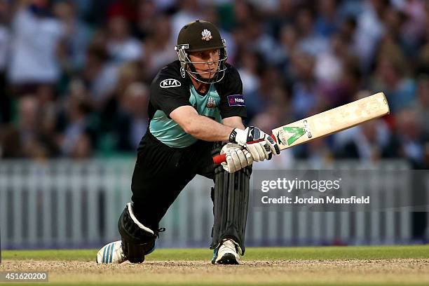 Gary Wilson of Surrey hits out during the Natwest T20 Blast match between Surrey and Kent Spitfires at The Kia Oval on July 2, 2014 in London,...