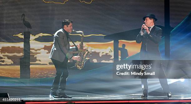 Dave Koz and Bobby Caldwell perform during the Soul Train Awards 2013 at the Orleans Hotel & Casino on November 8, 2013 in Las Vegas, Nevada.