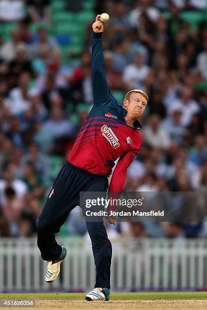 Adam Riley of Kent bowls during the Natwest T20 Blast match between Surrey and Kent Spitfires at The Kia Oval on July 2, 2014 in London, England.