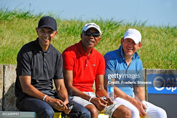 The French actor Dany Boon the football coach Antoine Kombouare and actor Roschdy Zem during the Pro-Am Rolex before the Alstom Open de France at...