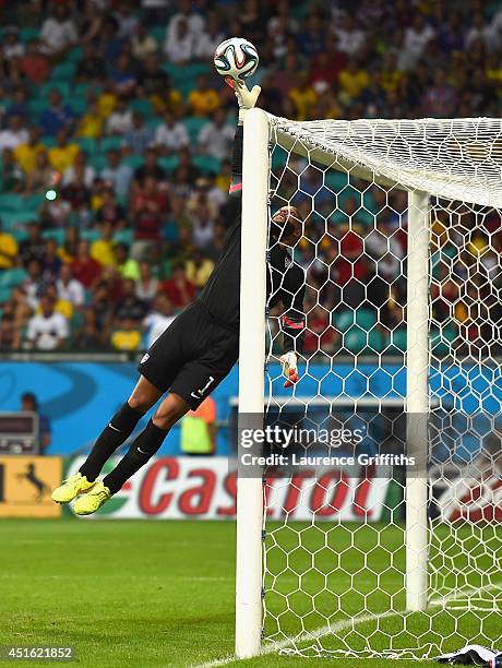 Tim Howard of the United States makes a fingertip save during the 2014 FIFA World Cup Brazil Round of 16 match between Belgium and the United States...