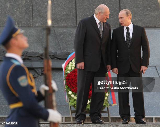 Russian President Vladimir Putin and Belarusian President Alexander Lukashenko attend a wreath laying ceremony at the Monument of the Victory on July...