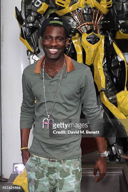 Wretch 32 attends a special screening of "Transformers: Age of Extinction" at the BFI IMAX on July 2, 2014 in London, England.