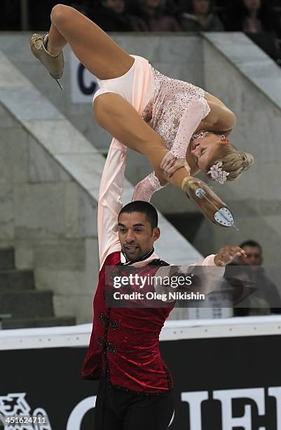 Aliona Savchenko and Robin Szolkowy of Germany skate in the Pairs Free Skating during ISU Rostelecom Cup of Figure Skating 2013 on November 23, 2013...