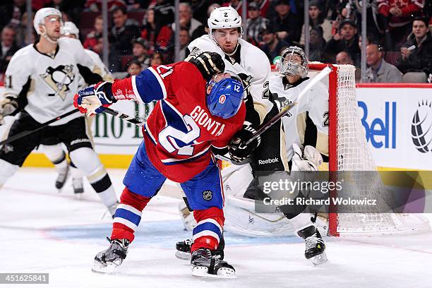 Matt Niskanen of the Pittsburgh Penguins is called for roughing Brian Gionta of the Montreal Canadiens during the NHL game at the Bell Centre on...